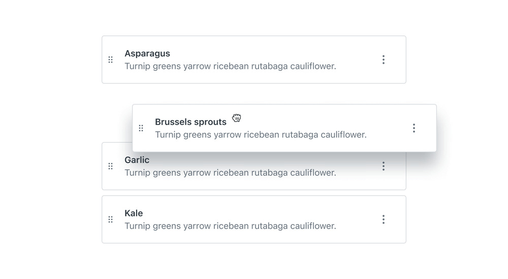 Four draggable items each containing a description and an overflow icon with the second item being dragged.